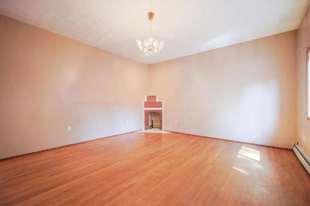 Chandelier, Empty room, Fireplace, Interior, Pendant Lights, Wood Texture Flooring