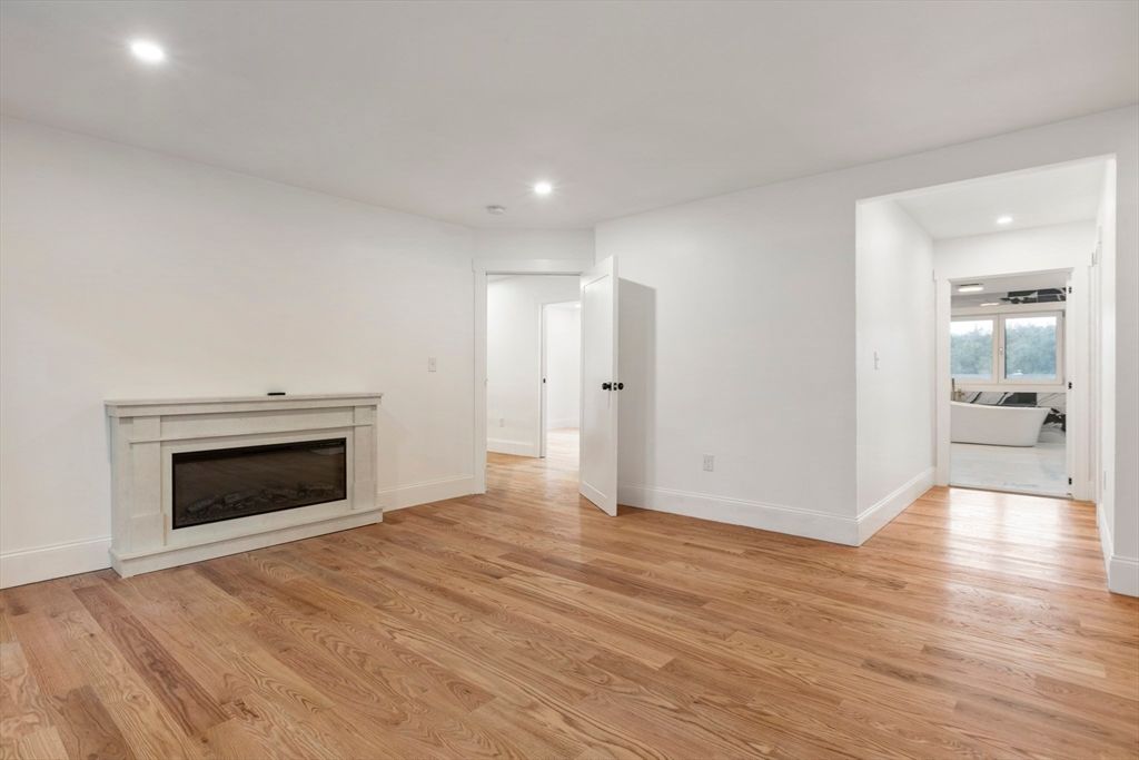 Empty room, Fireplace, Interior, Recessed Lighting, Wood Texture Flooring