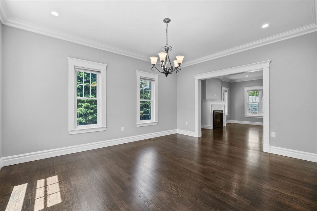 Chandelier, Empty room, Fireplace, Interior, Recessed Lighting, Wood Texture Flooring