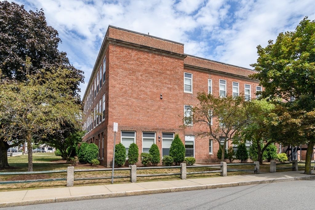 Exterior, Facade, Brick Facade, Condo Building
