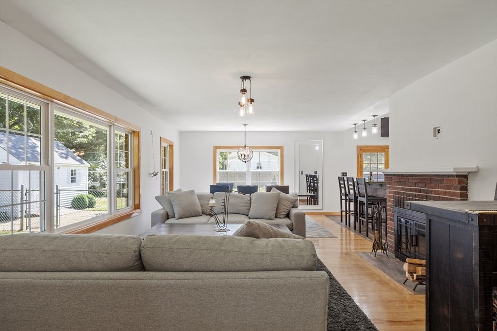 Dining room, Fireplace, Interior, Living room, Pendant Lights, Wood Texture Flooring