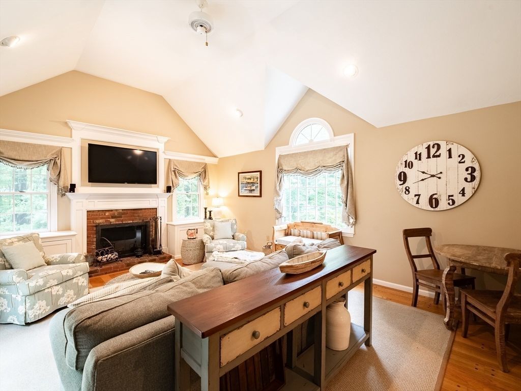 Dining room, Fireplace, Interior, Living room, Recessed Lighting, Wood Texture Flooring