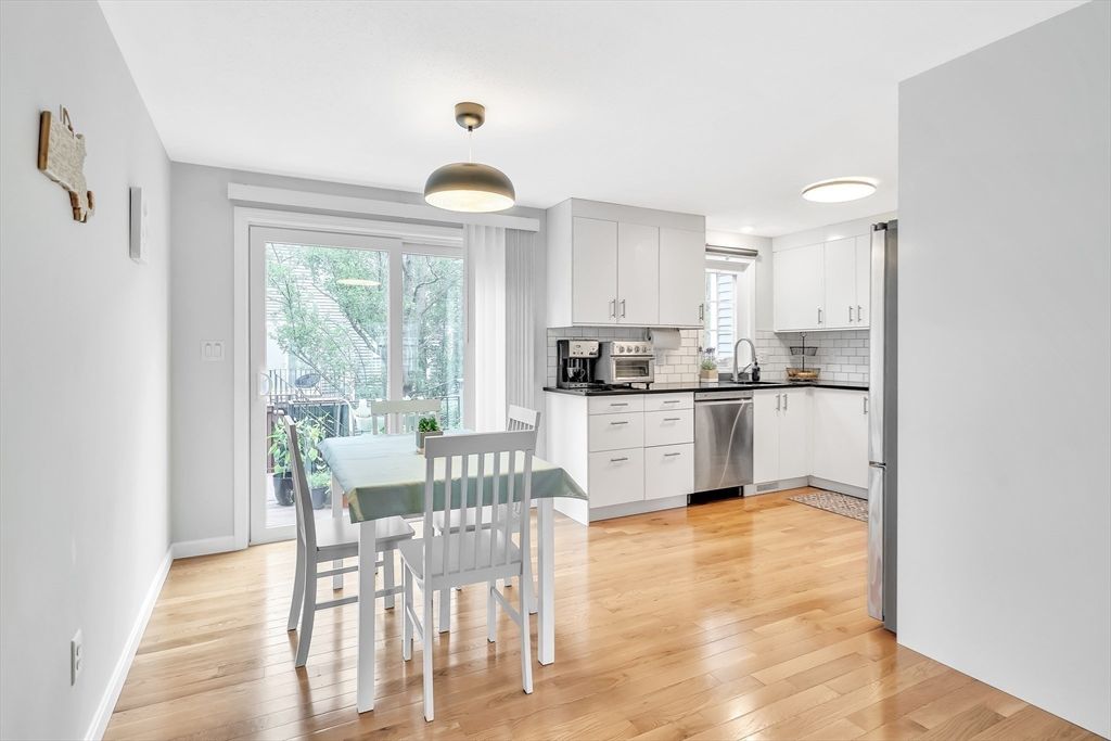 Dining room, Interior, Kitchen, Recessed Lighting, Stainless Steel Appliances, Wood Texture Flooring