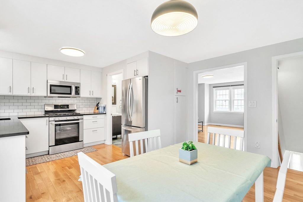 Dining room, Interior, Kitchen, Recessed Lighting, Stainless Steel Appliances, Wood Texture Flooring