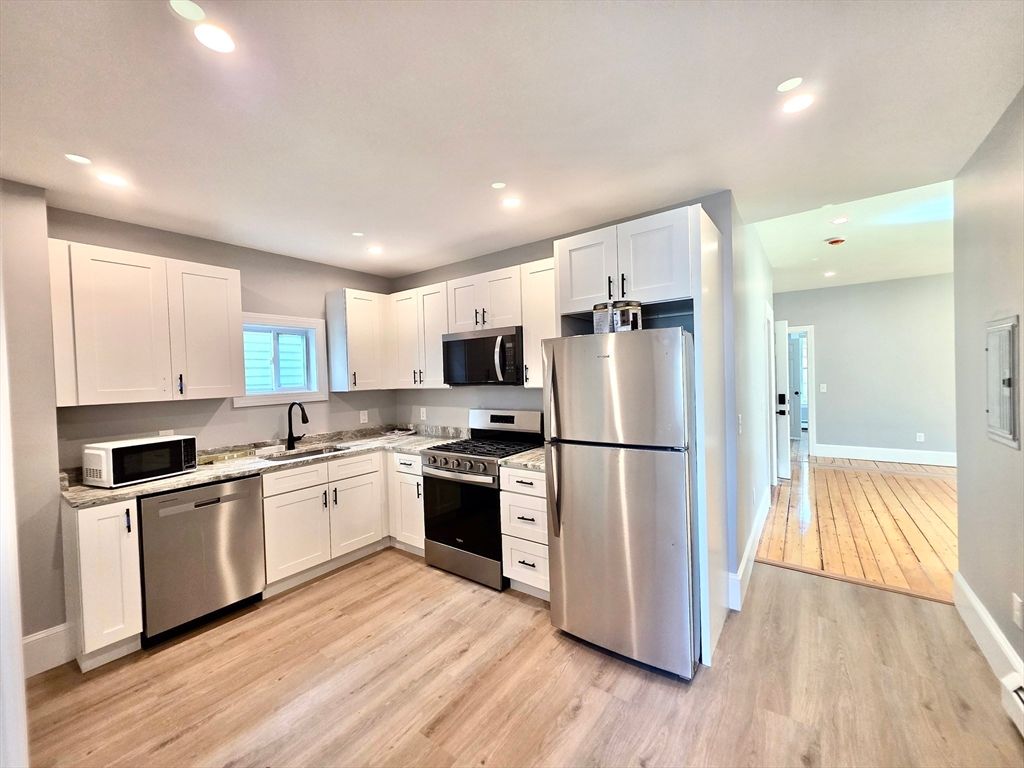 Interior, Kitchen, Recessed Lighting, Stainless Steel Appliances, Wood Texture Flooring