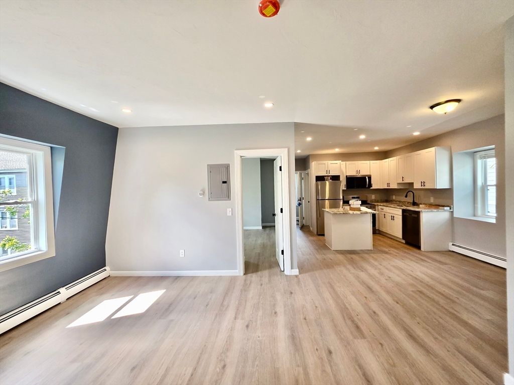 Interior, Kitchen, Recessed Lighting, Stainless Steel Appliances, Wood Texture Flooring