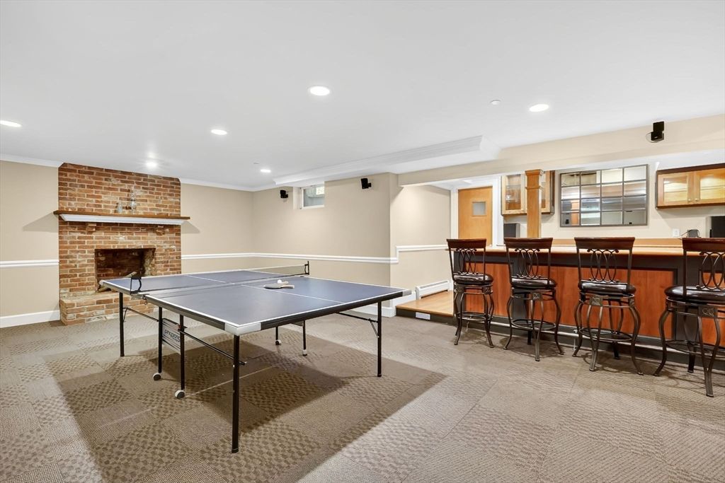 Fireplace, Game Room, Interior, Recessed Lighting, Stone Walls