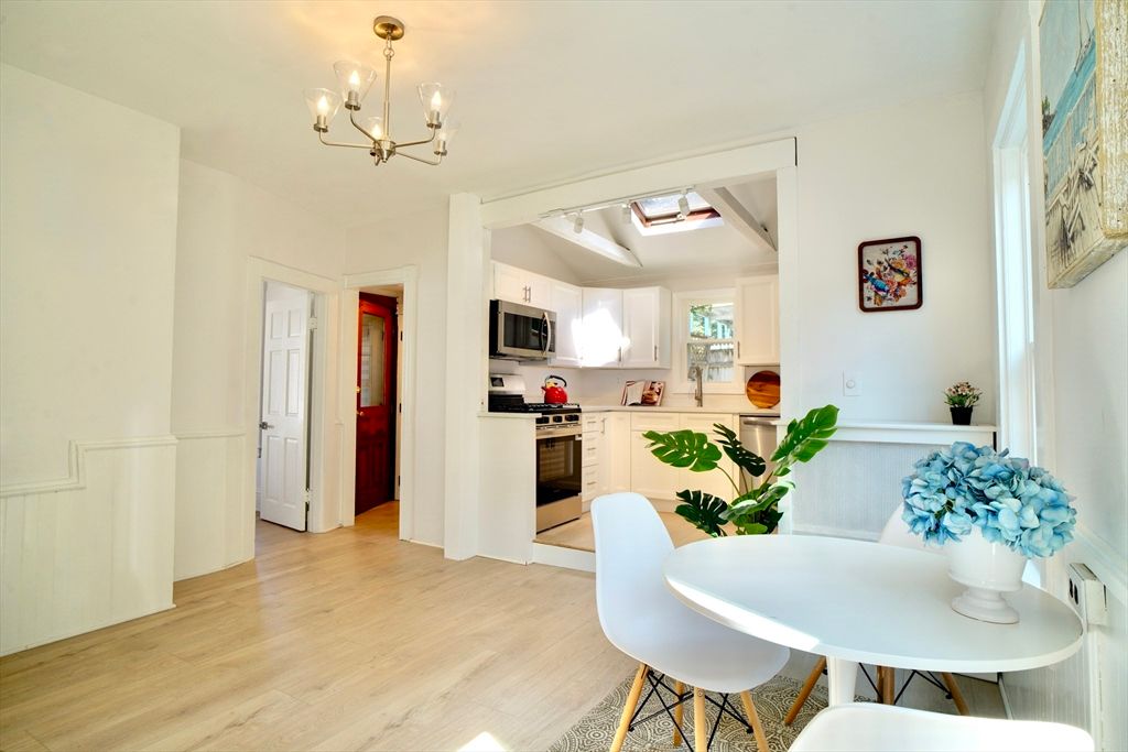 Chandelier, Dining room, Interior, Kitchen, Stainless Steel Appliances, Wood Texture Flooring