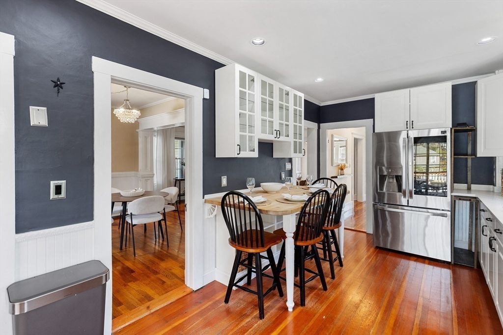 Chandelier, Dining room, Interior, Kitchen, Recessed Lighting, Stainless Steel Appliances, Wood Texture Flooring