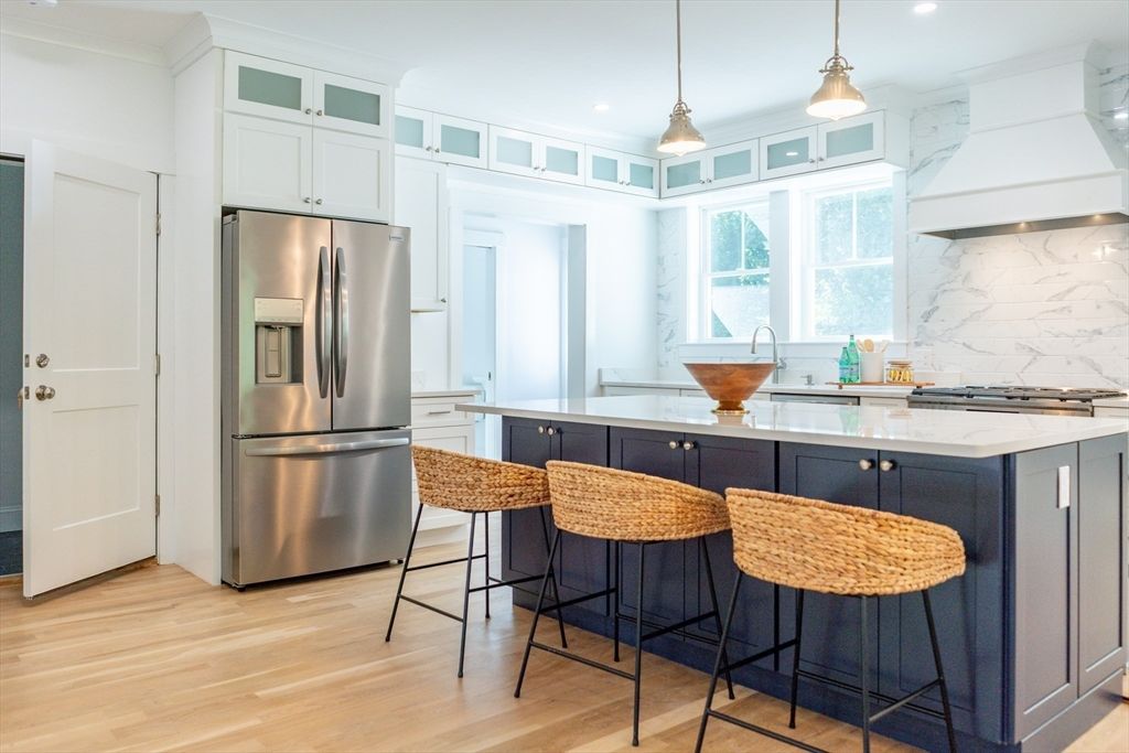 Interior, Kitchen, Marble Walls, Pendant Lights, Recessed Lighting, Stainless Steel Appliances, Wood Texture Flooring