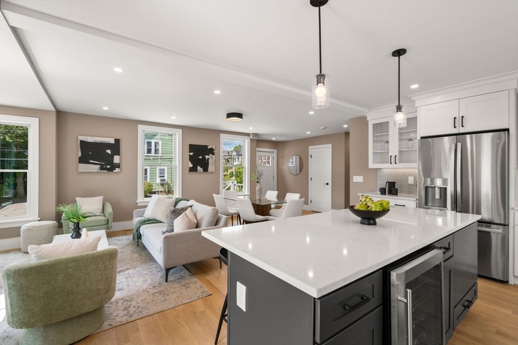 Dining room, Interior, Kitchen, Living room, Pendant Lights, Recessed Lighting, Stainless Steel Appliances, Wood Texture Flooring