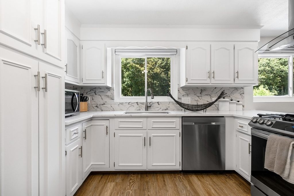 Interior, Kitchen, Marble Walls, Stainless Steel Appliances, Wood Texture Flooring