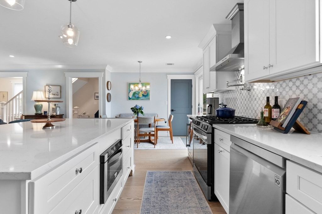 Dining room, Interior, Kitchen, Pendant Lights, Recessed Lighting, Stainless Steel Appliances, Wood Texture Flooring