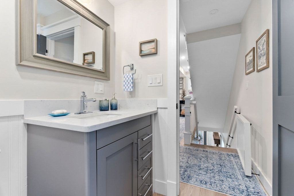 Bathroom, Dual Sink Vanities, Interior, Recessed Lighting, Wood Texture Flooring