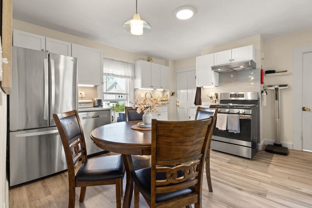 Dining room, Interior, Kitchen, Pendant Lights, Recessed Lighting, Stainless Steel Appliances, Wood Texture Flooring