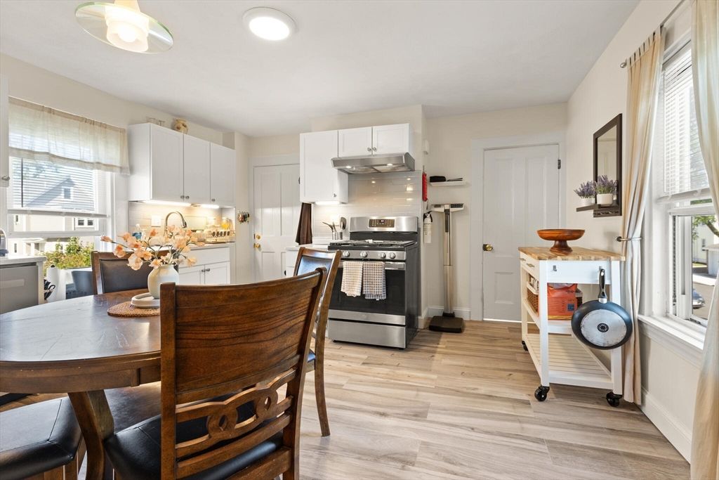 Dining room, Interior, Kitchen, Recessed Lighting, Stainless Steel Appliances, Wood Texture Flooring