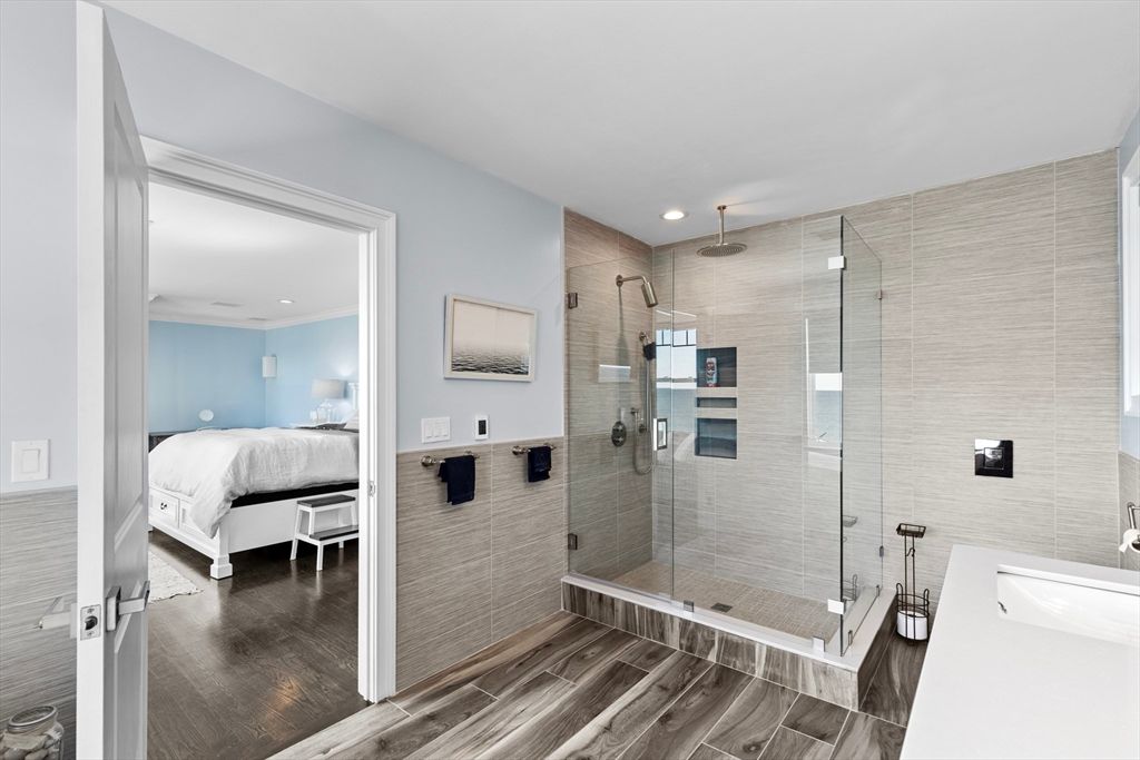 Bathroom, Bedroom, Dual Sink Vanities, Glass Shower, Interior, Recessed Lighting, Wood Texture Flooring