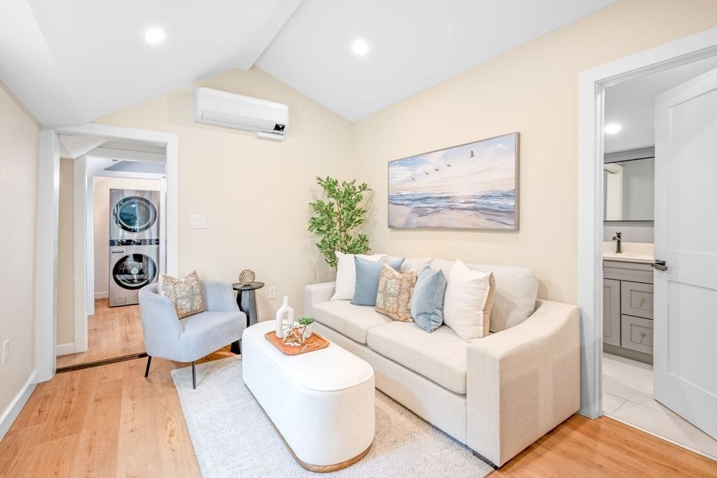 Interior, Living room, Recessed Lighting, Utility Closets, Washer, Wood Texture Flooring