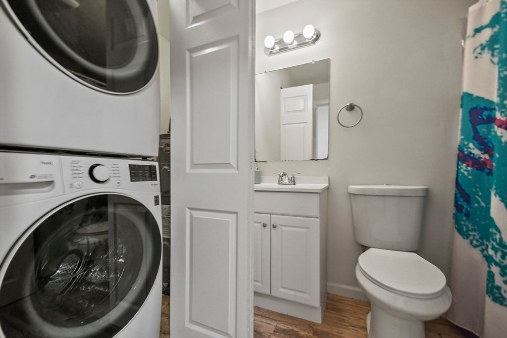 Bathroom, Interior, Utility Closets, Washer, Wood Texture Flooring