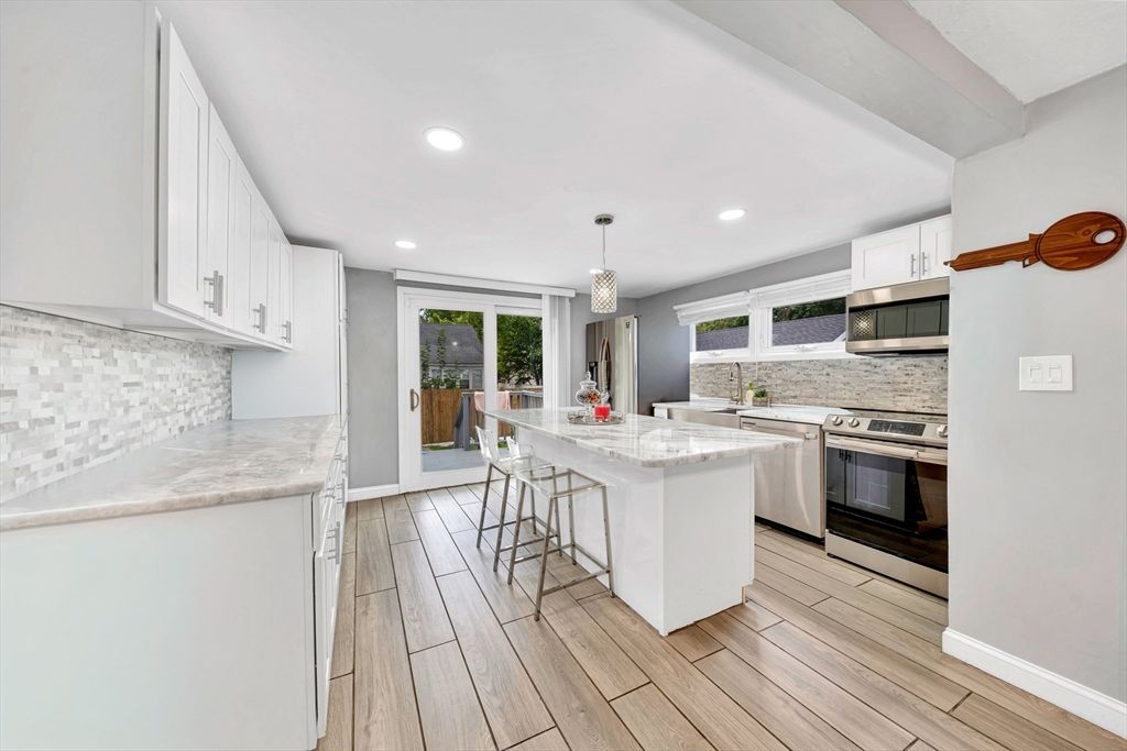Chandelier, Interior, Kitchen, Pendant Lights, Recessed Lighting, Stainless Steel Appliances, Wood Texture Flooring