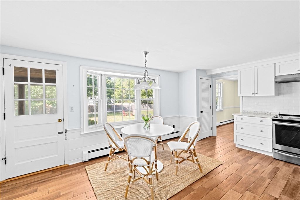 Dining room, Interior, Kitchen, Pendant Lights, Stainless Steel Appliances, Wood Texture Flooring