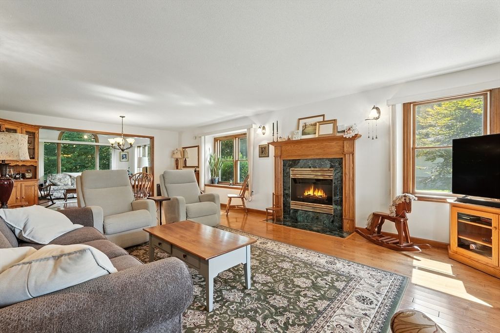 Chandelier, Dining room, Fireplace, Interior, Living room, Wood Texture Flooring