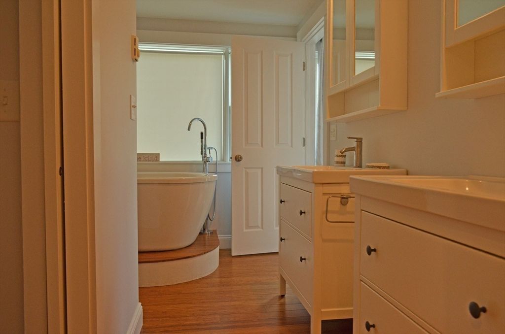 Bathroom, Dual Sink Vanities, Free Standing Baths, Interior, Wood Texture Flooring