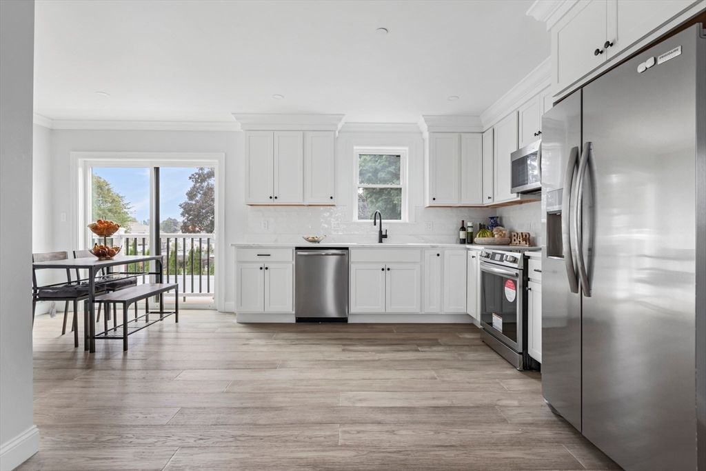 Dining room, Interior, Kitchen, Recessed Lighting, Stainless Steel Appliances, Wood Texture Flooring
