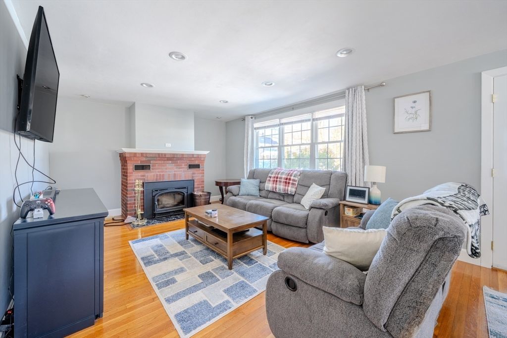 Fireplace, Interior, Living room, Recessed Lighting, Wood Texture Flooring