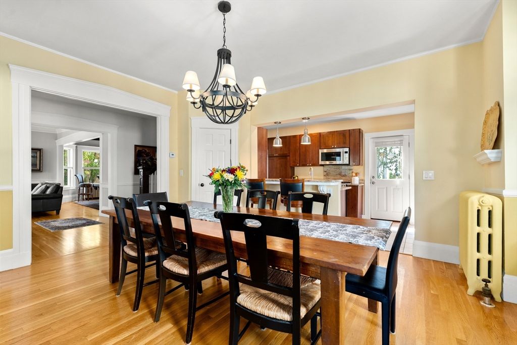 Chandelier, Dining room, Interior, Kitchen, Stainless Steel Appliances, Wood Texture Flooring