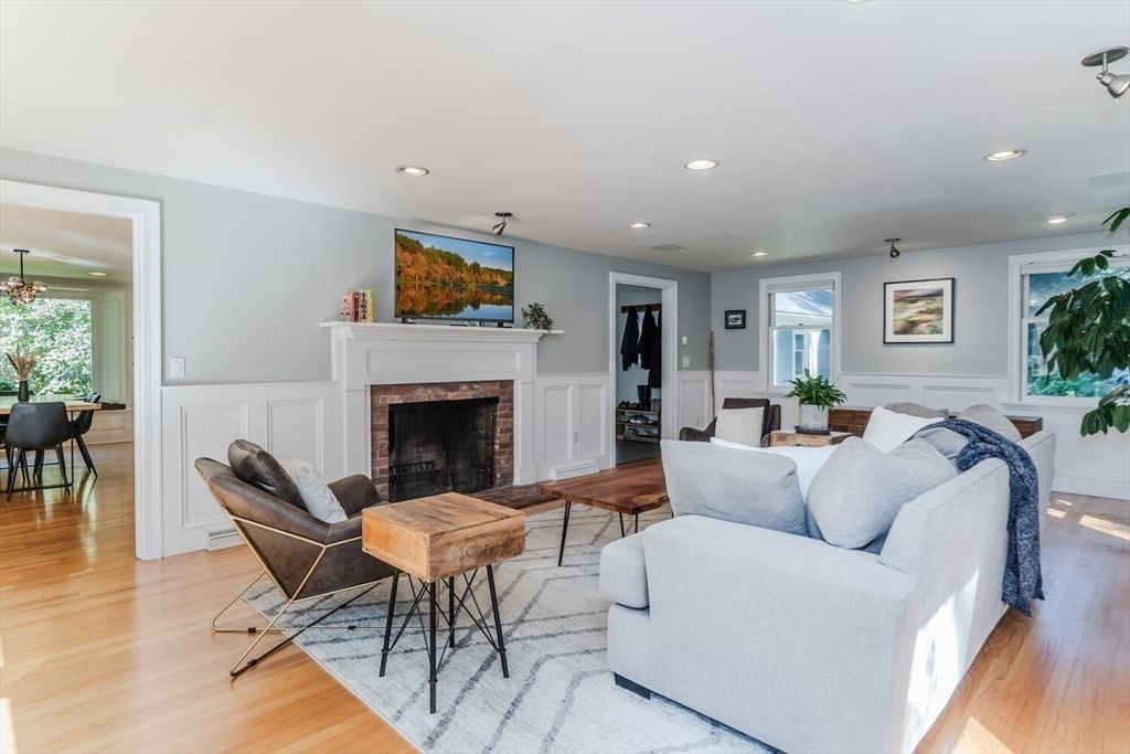Dining room, Fireplace, Interior, Living room, Recessed Lighting, Wood Texture Flooring