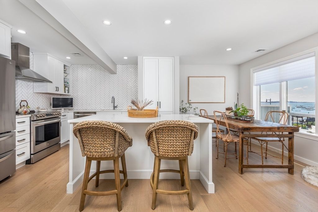 Dining room, Interior, Kitchen, Recessed Lighting, Stainless Steel Appliances, Water, Wood Texture Flooring