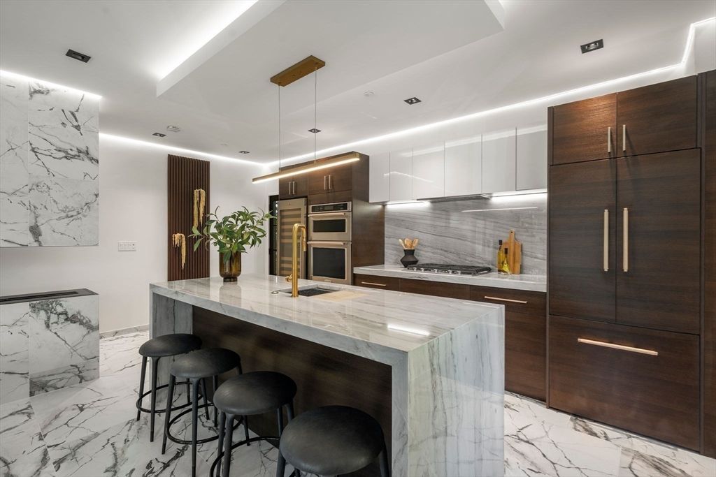 Interior, Kitchen, Marble, Marble Walls, Pendant Lights, Recessed Lighting, Stainless Steel Appliances