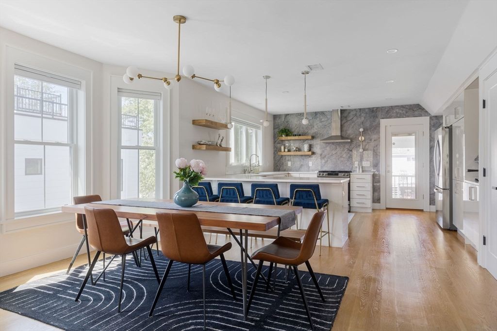 Dining room, Interior, Kitchen, Pendant Lights, Recessed Lighting, Stainless Steel Appliances, Wood Texture Flooring