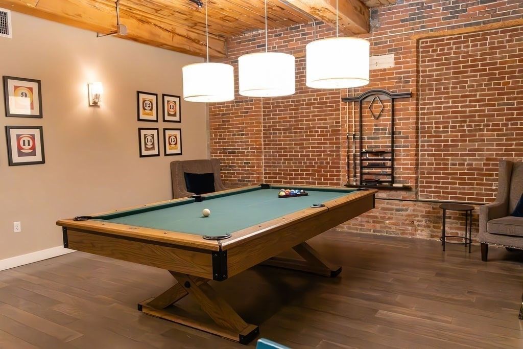 Billiard Table, Game Room, Interior, Pendant Lights, Stone Walls, Wood Texture Flooring