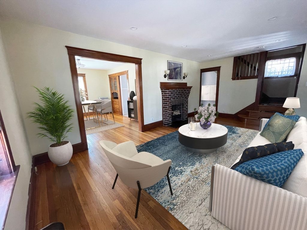 Dining room, Fireplace, Interior, Living room, Recessed Lighting, Wood Texture Flooring