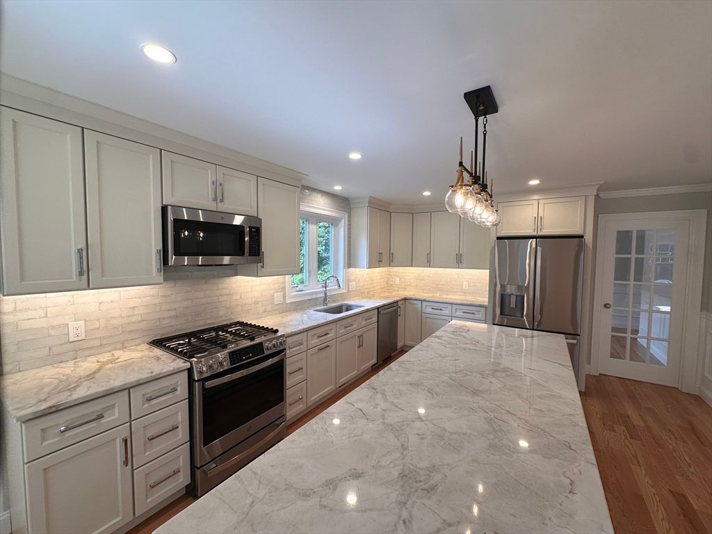 Interior, Kitchen, Marble, Pendant Lights, Recessed Lighting, Stainless Steel Appliances, Wood Texture Flooring
