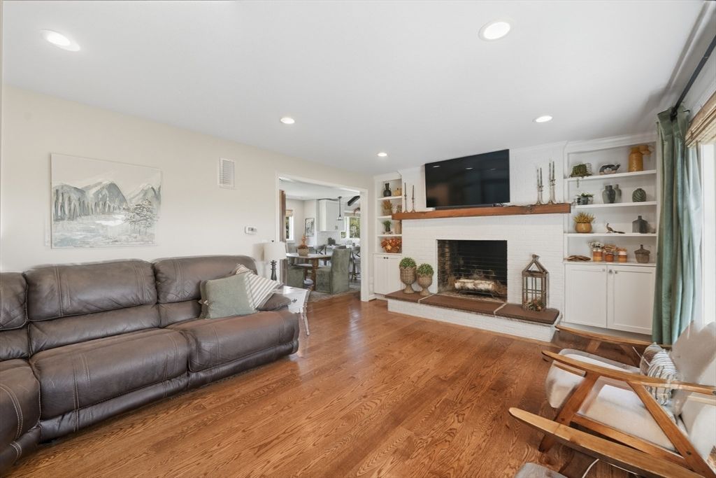 Dining room, Fireplace, Interior, Living room, Recessed Lighting, Wood Texture Flooring