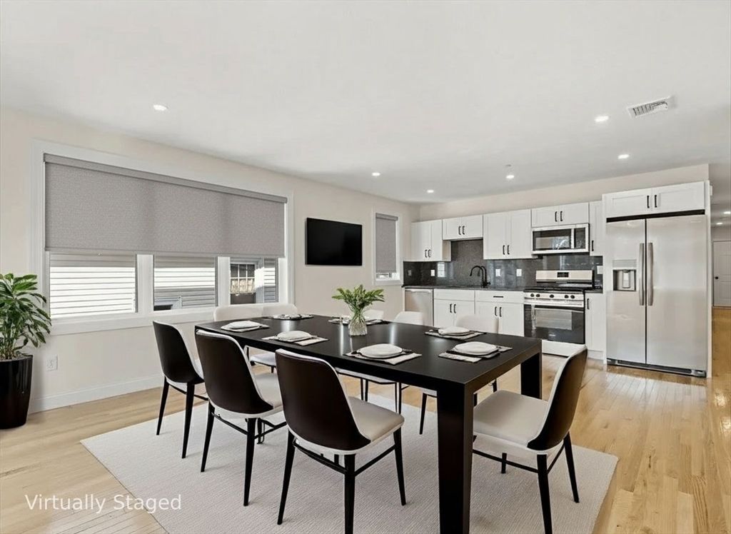 Dining room, Interior, Kitchen, Recessed Lighting, Stainless Steel Appliances, Wood Texture Flooring