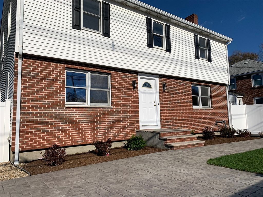 Exterior, Facade, Brick Facade, Raised Ranch