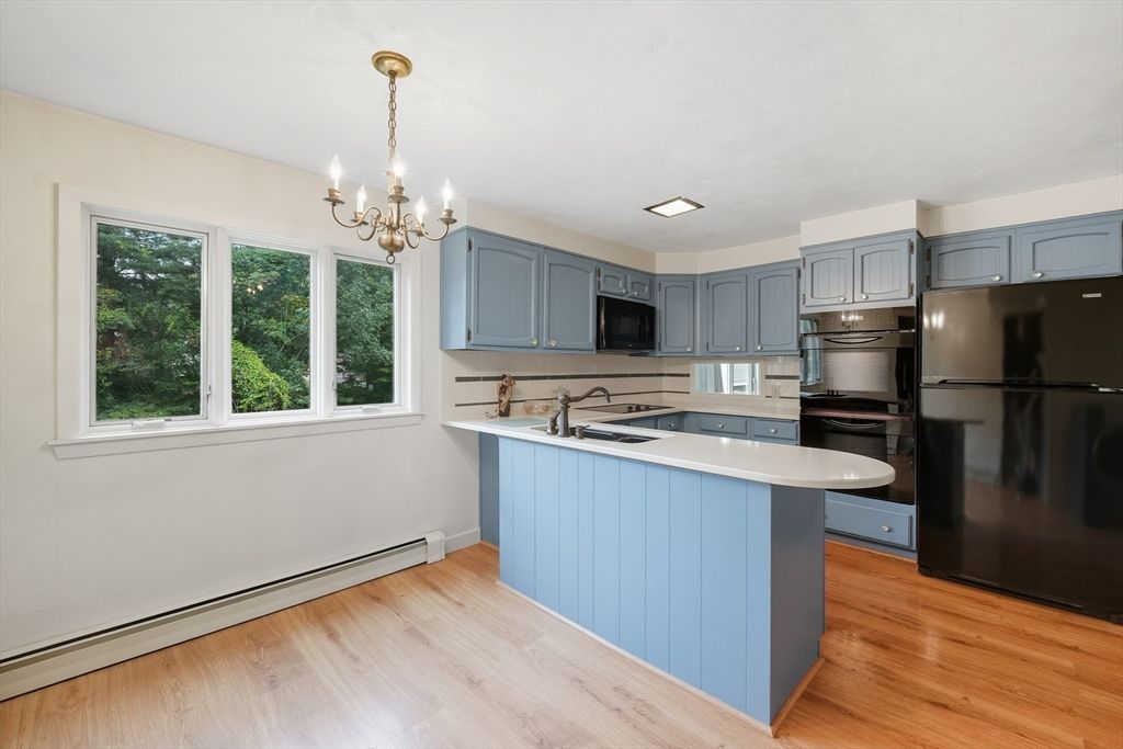 Chandelier, Interior, Kitchen, Recessed Lighting, Stainless Steel Appliances, Wood Texture Flooring
