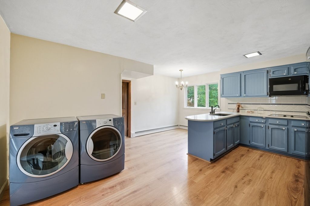 Chandelier, Interior, Kitchen, Recessed Lighting, Washer, Wood Texture Flooring