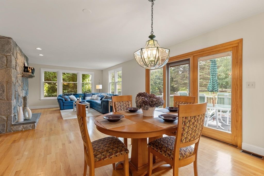 Dining room, Fireplace, Interior, Living room, Pendant Lights, Recessed Lighting, Wood Texture Flooring