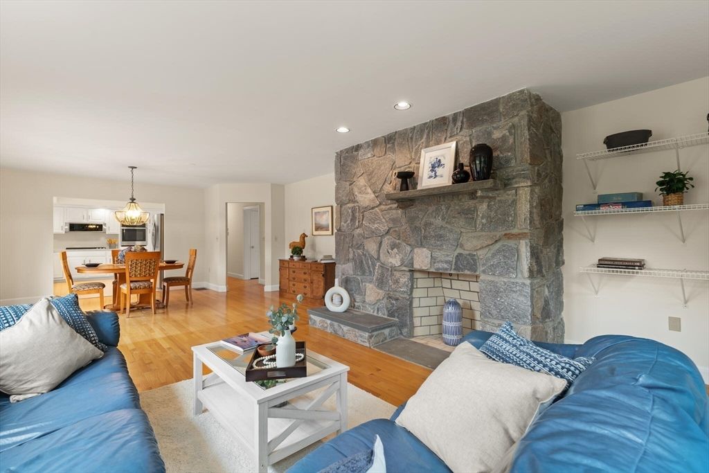 Chandelier, Dining room, Fireplace, Interior, Living room, Recessed Lighting, Stone Walls, Wood Texture Flooring