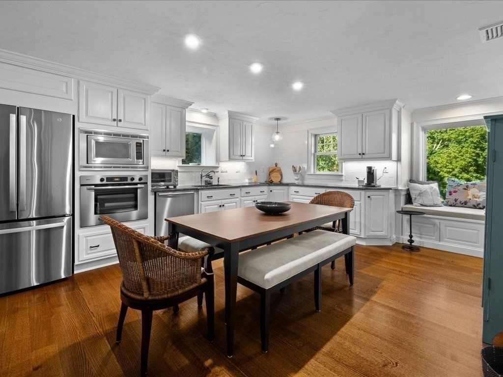 Dining room, Interior, Kitchen, Pendant Lights, Recessed Lighting, Stainless Steel Appliances, Wood Texture Flooring