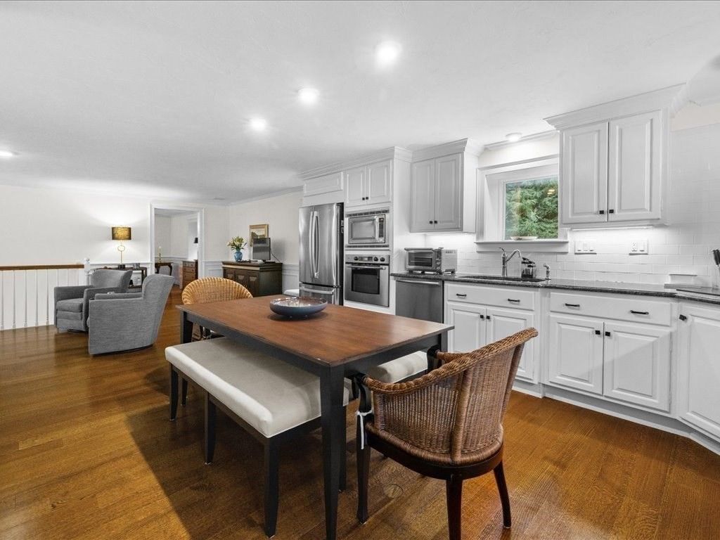 Dining room, Interior, Kitchen, Living room, Recessed Lighting, Stainless Steel Appliances, Wood Texture Flooring