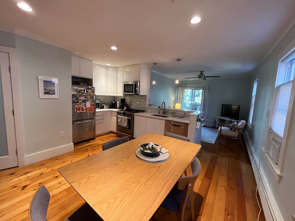 Dining room, Interior, Kitchen, Pendant Lights, Recessed Lighting, Stainless Steel Appliances, Wood Texture Flooring