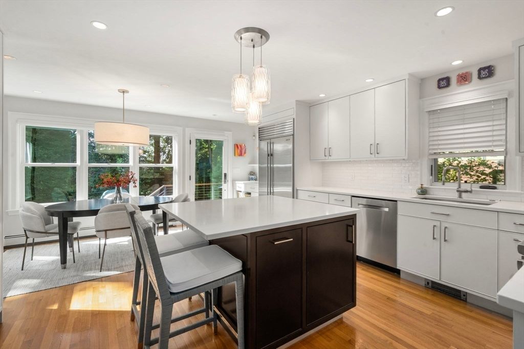 Dining room, Interior, Kitchen, Pendant Lights, Recessed Lighting, Stainless Steel Appliances, Wood Texture Flooring