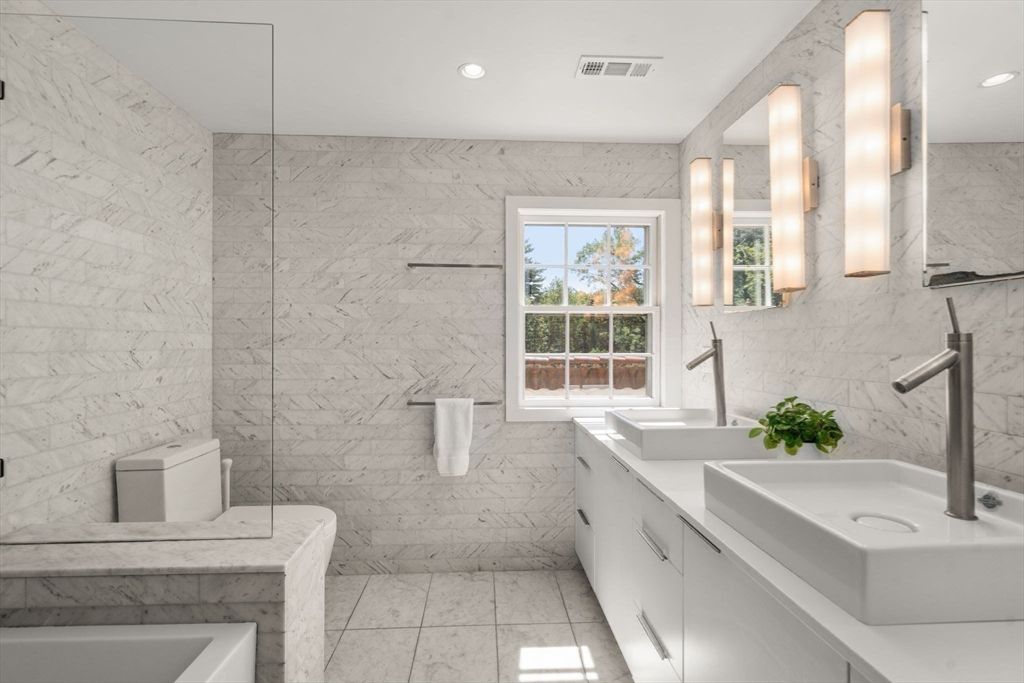 Bathroom, Dual Sink Vanities, Glass Shower, Interior, Marble, Marble Walls, Recessed Lighting