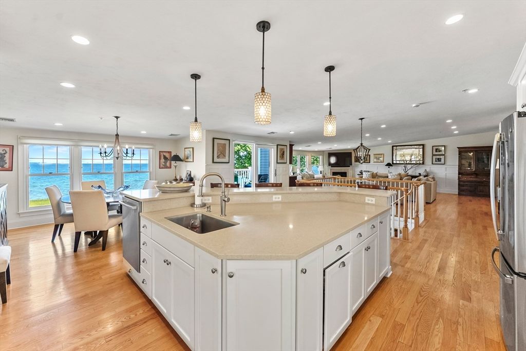 Chandelier, Dining room, Interior, Kitchen, Pendant Lights, Recessed Lighting, Water, Wood Texture Flooring